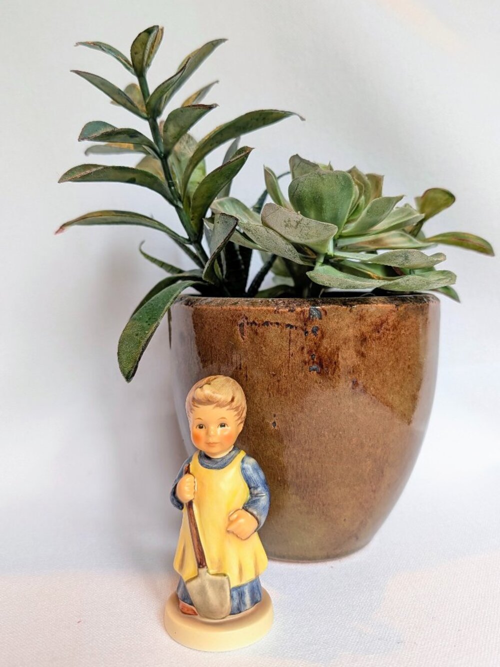 M.I. Hummel figurine is titled "Garden Treasures" - #727